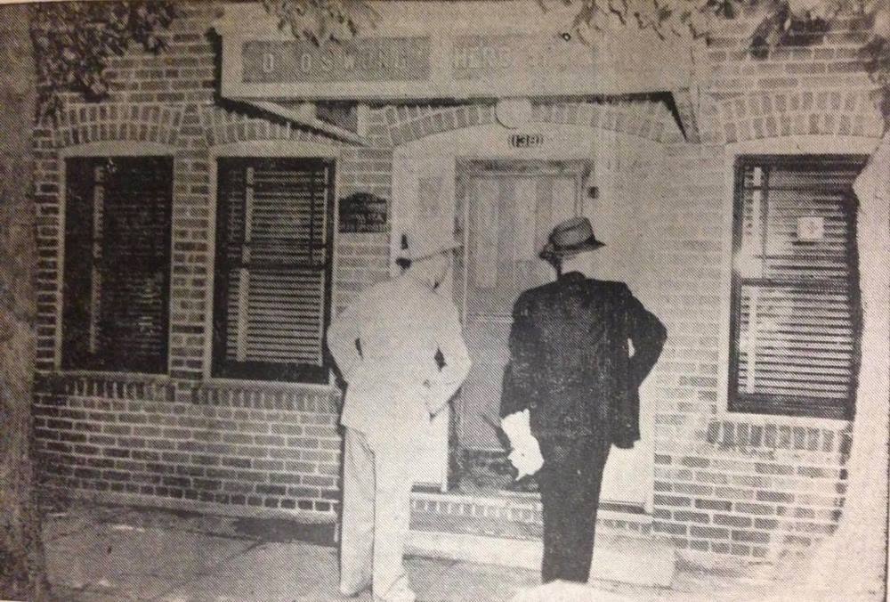 Officers visiting the office of Q.S. Wong, 1941